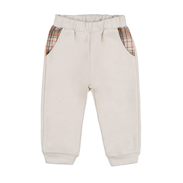 Pantaloni crem din fleece cu buzunare laterale pentru copii